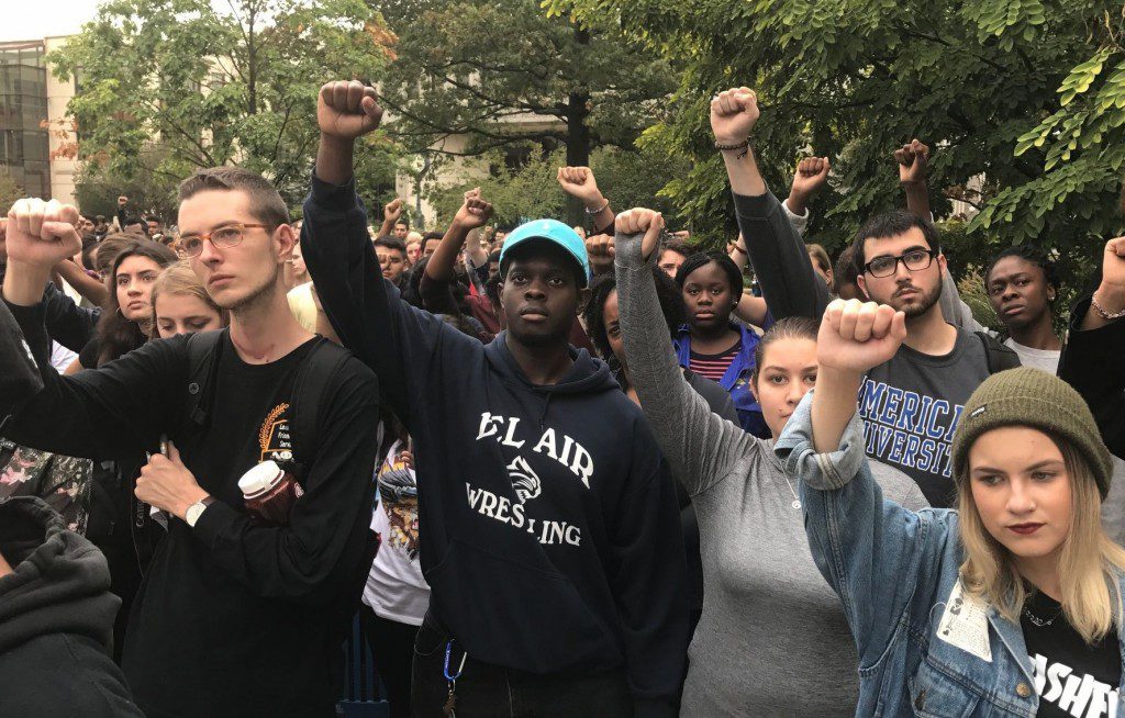 Students protest at American University on Monday, Sept. 19, following racist incidents at a student dorm, including one in which a banana was thrown at a black student. (Photo Credit: Alejandra Matos/The Washington Post)