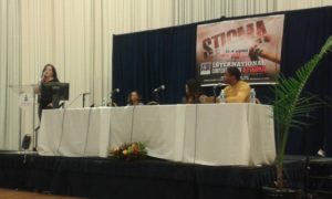 Nicole Seguin, Positive Women’s Network secretary, speaks during 7th Annual International Conference on Stigma held at Howard University on Friday, Nov. 18. (Photo Credit: Sytonia Reid, Contributing Writer/The Hilltop)